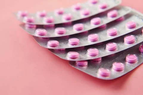 Close up of pills of blister pack on table Stock Photos