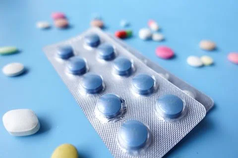 Close up of pills of blister pack on table Stock Photos