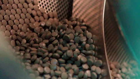 Close up Pills in Coating machine slow motion 100fps Stock-Footage 156062447