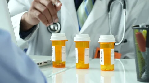Close up of pills on a Doctor's desk 스톡 동영상 55851924