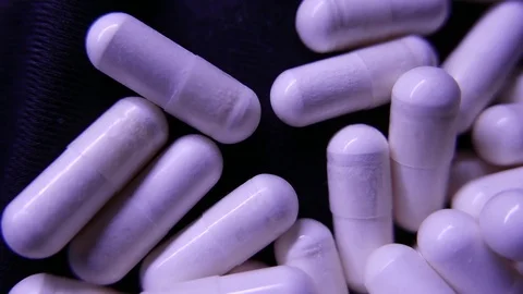 Close up with pills rotating. 4K UHD Stock Footage 72830045