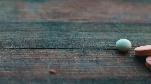 Close up with pills rotating Stock Footage