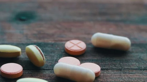 Close up with pills rotating Stock Footage