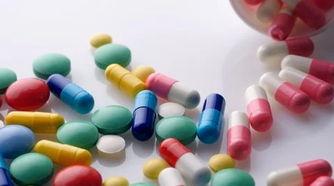 Close up of pills. White background. Sliding camera Video stock 46004603