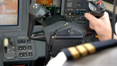 Close up of a pilot in cockpit. Turbulent conditions. Flat plane. Blurred Stock Footage 105368791