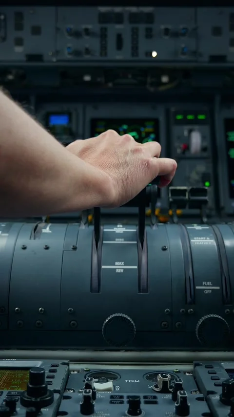 Close-up of Pilot Hands Adjusting Thrust Levers in Aircraft Cockpit Stock Footage 334970792