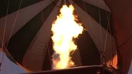 Close Up: Pilot Inflates Safari Balloon With Hot Air By Activating The Burners Stock Footage