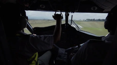 Close-up of pilots land the light plane in clear weather Video stock 113731982