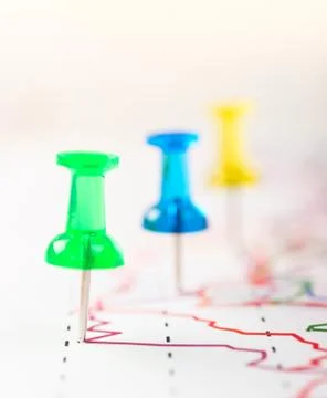 Close up of pin on graph data. Finance concept Stock Photos