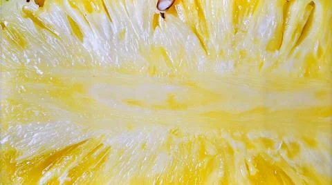 Close up pineapple flesh surface showing natural tropical fruit texture and.. Stock Photos