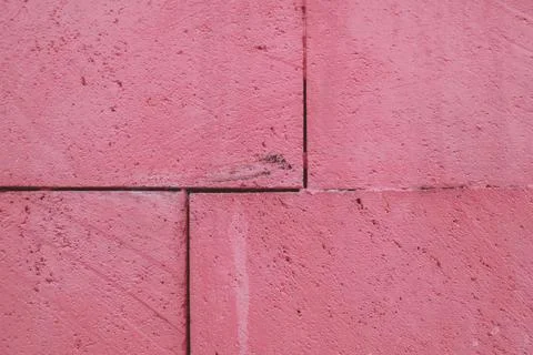 Close up of a pink brick wall or road, old stone textured background. 写真素材