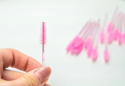 Close up of pink brushes for combing eyelash extensions and brows Stock Photos