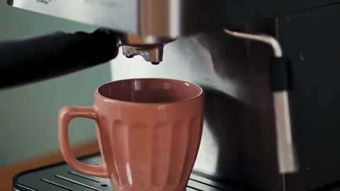Close-up of Pink Coffee Cup under Espresso Nozzle Stock Footage 346637350