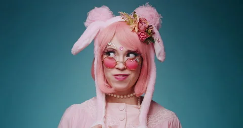 Close up of pink cute candy anime girl with rabbit ears and pink sunglasses make Stock-Footage 156859119