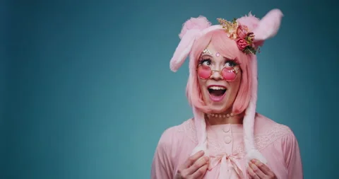 Close up of pink cute candy anime girl with rabbit ears and pink sunglasses make Stock-Footage 156859330