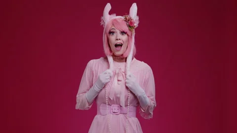 Close up of pink cute candy anime girl with rabbit ears and pink sunglasses make Stock Footage 168381394