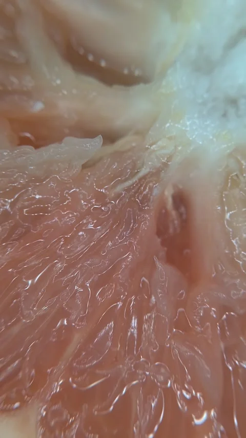Close-up of pink grapefruit pulp. Stock Footage 334859392