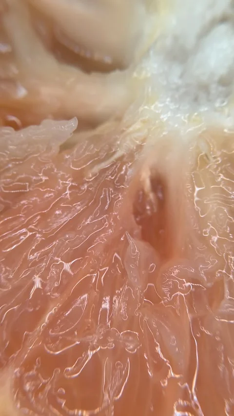 Close-up of pink grapefruit pulp. Stock Footage 334859395
