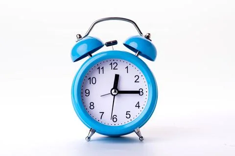 Close-up of Pink Table Alarm Clock on White Background Stock Photos