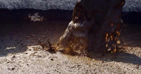 Close up of a pipe is pumping organic cow  manure compos  used for biogas. Stock Footage 121544801