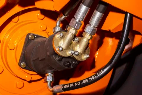 Close up of pipe system of hydraulic valves in agricultural machinery Stock Photos