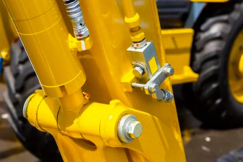 Close up of pipe system of hydraulic valves in agricultural machinery Stock Photos