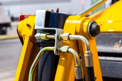 Close up of pipe system of hydraulic valves in agricultural machinery Stock Photos