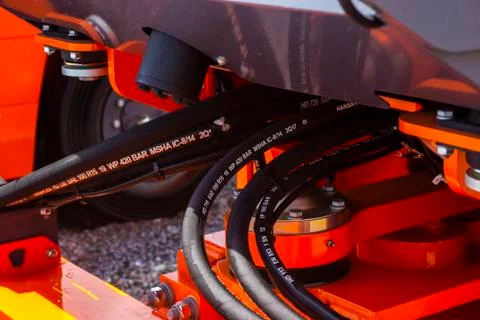 Close up of pipe system of hydraulic valves in agricultural machinery Stock Photos