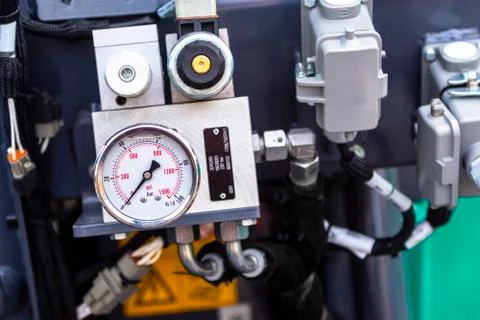 Close up of pipe system of hydraulic valves in agricultural machinery Stock Photos