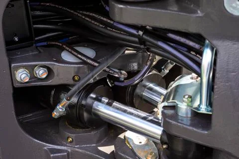 Close up of pipe system of hydraulic valves in agricultural machinery Stock Photos
