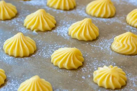 Close-up of Piped Uncooked Cream Puff Dough Stock Photos