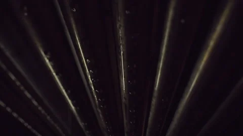 Close-up of pipes overhead in a basement sweating and dripping water Vidéo 202895523