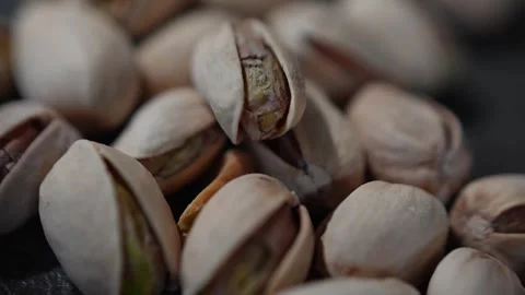 Close-up of pistachios  4K slow-motion video for food, snacks and nutrition Stock Footage 323067669