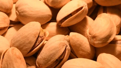 Close up of pistachios rotating on dolly. 4K Ultra HD video Stock Footage 88428640