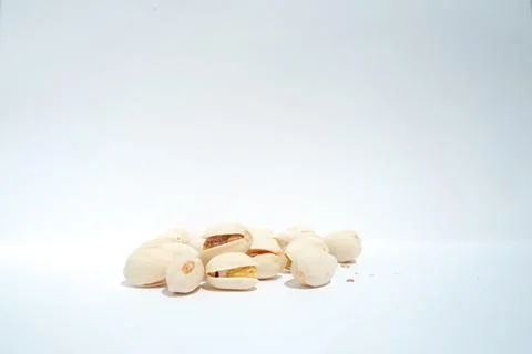 Close up of pistachios on white background Foto stock