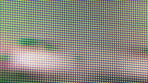 Close-up pixel noise storm video, macro tv screen LCD, CRT Video stock 259645875