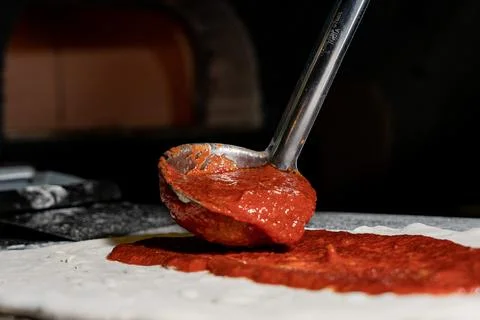 Close up of the pizza preparation process Stock Photos