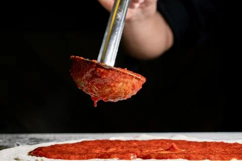 Close up of the pizza preparation process Stock Photos