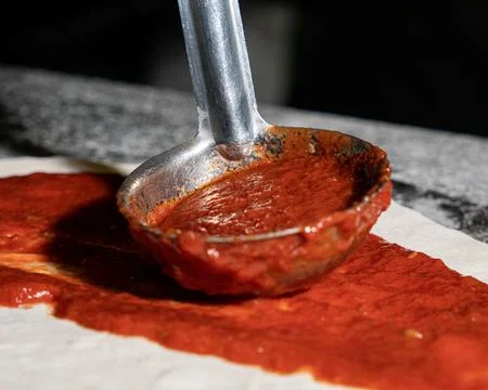 Close up of the pizza preparation process Stock Photos