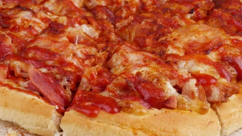 Close up pizza rotating on a box Stock Footage 166732854