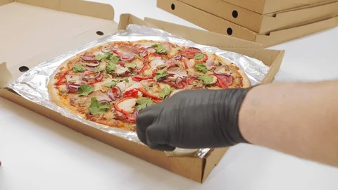 Close-up of pizza with sauce in box 動画素材 129875361