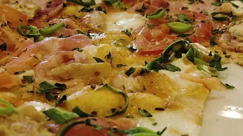 Close-up of a pizza slice. Stock Footage 312311244