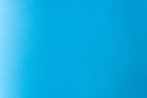A close-up of a plain blue paper surface with a subtle texture. 스톡 일러스트