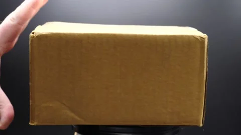 Close up on a plain brown cardboard package 스톡 동영상 169777707