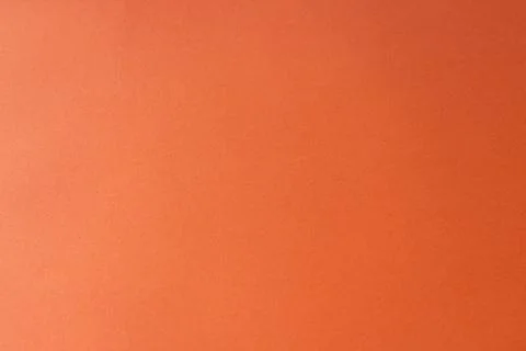 Close-up of a plain orange paper surface with. Stock-Illustration