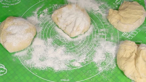 A Close-up Plan, Flour Strews on Pieces of Test Lying on a Table Stock Footage 87936228