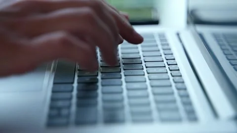 A close plan of women's hands actively pressing laptop keys. Stock Footage 234020671