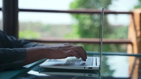 Close plan of women's hands typing confidently on a laptop keyboard Video stock 234020587
