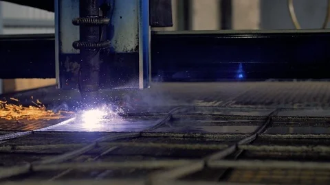 Close up of plasma cutter. Plasma robotic industrial equipment works with metall Stock Footage 93731322