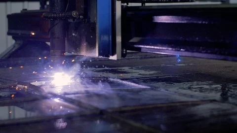Close up of plasma cutter. Plasma robotic industrial equipment works with metall Stock Footage 94325003